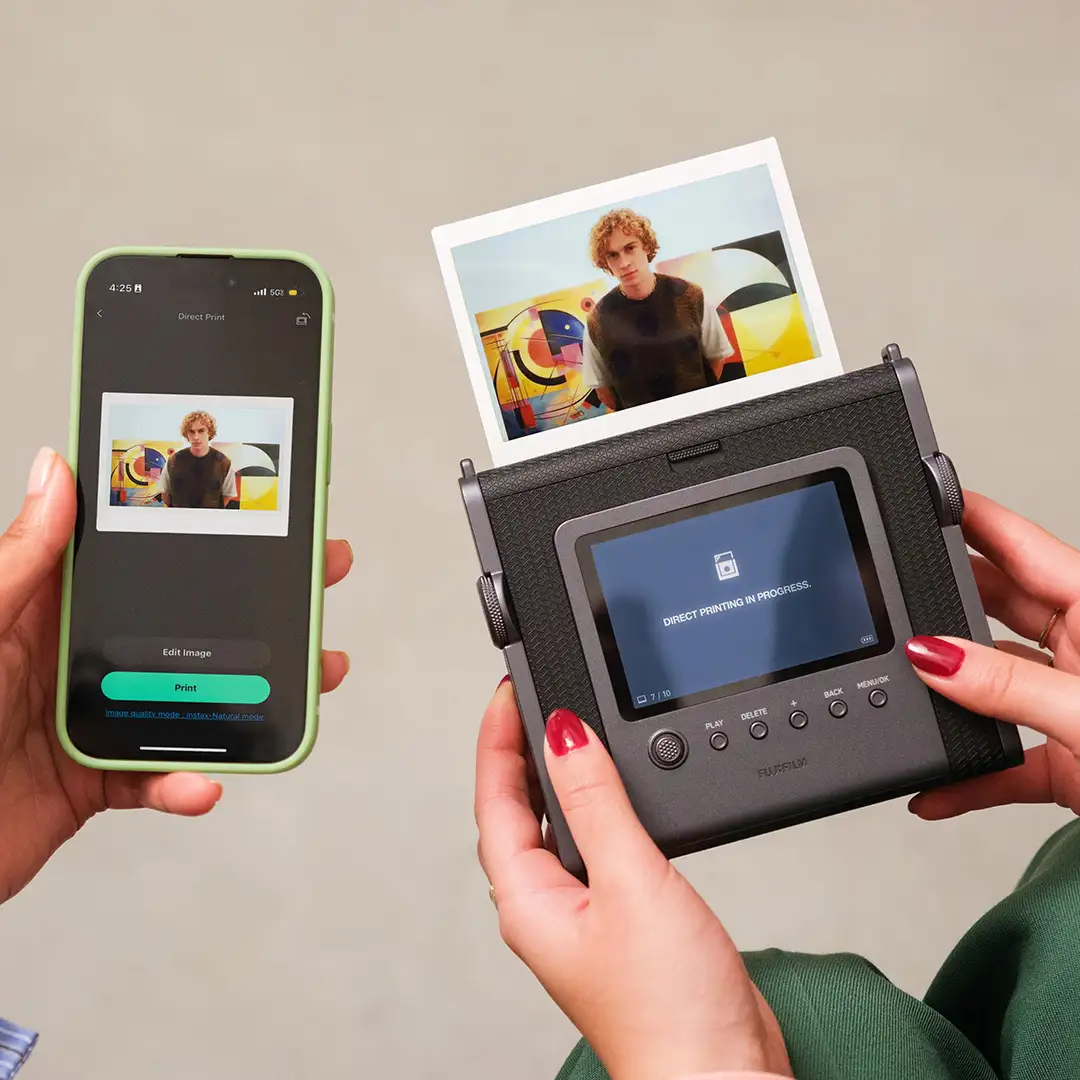 This INSTAX Wide EVO boasts a wide-angle lens for bigger shots - This INSTAX Wide EVO boasts a wide angle lens for bigger shots This INSTAX Wide EVO boasts a wide angle lens for bigger shots