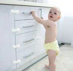Child-Proof Cabinet Latches tp Keep Curious Toddlers Away from Cabinets - 592959bb 6549 4d00 96e5 7d73221294d8. CR00970300 PT0 SX970 V1 592959bb 6549 4d00 96e5 7d73221294d8. CR00970300 PT0 SX970 V1